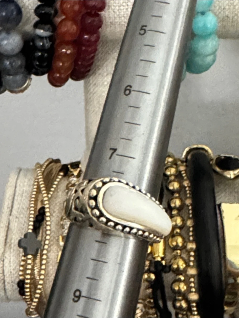 Sterling Silver Ring with White Center Stone and Beaded Edge